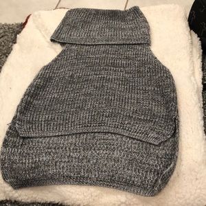Sleeveless sweater with fold over neck